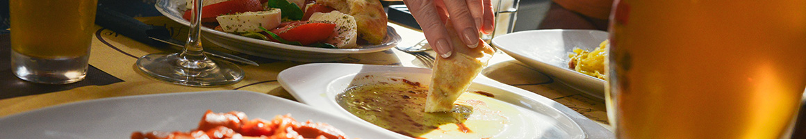 Eating Spanish Tapas Bars Tapas/Small Plates at El Pimiento Restaurant restaurant in Miami Lakes, FL.